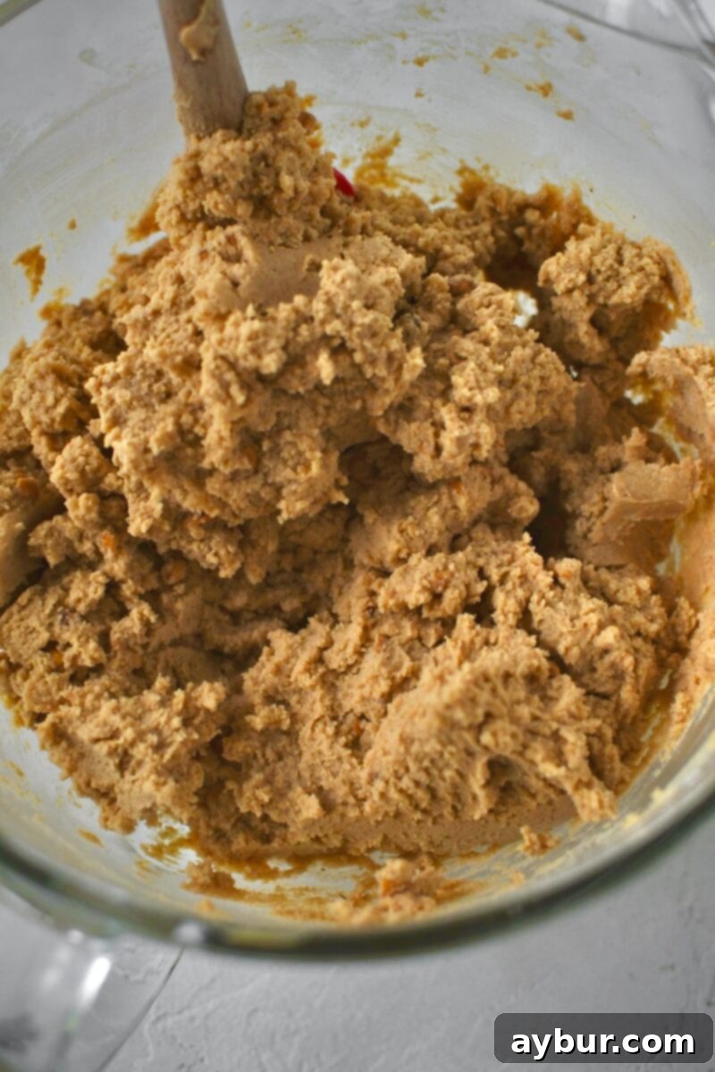 Dry ingredients worked into the creamed butters and sugars.