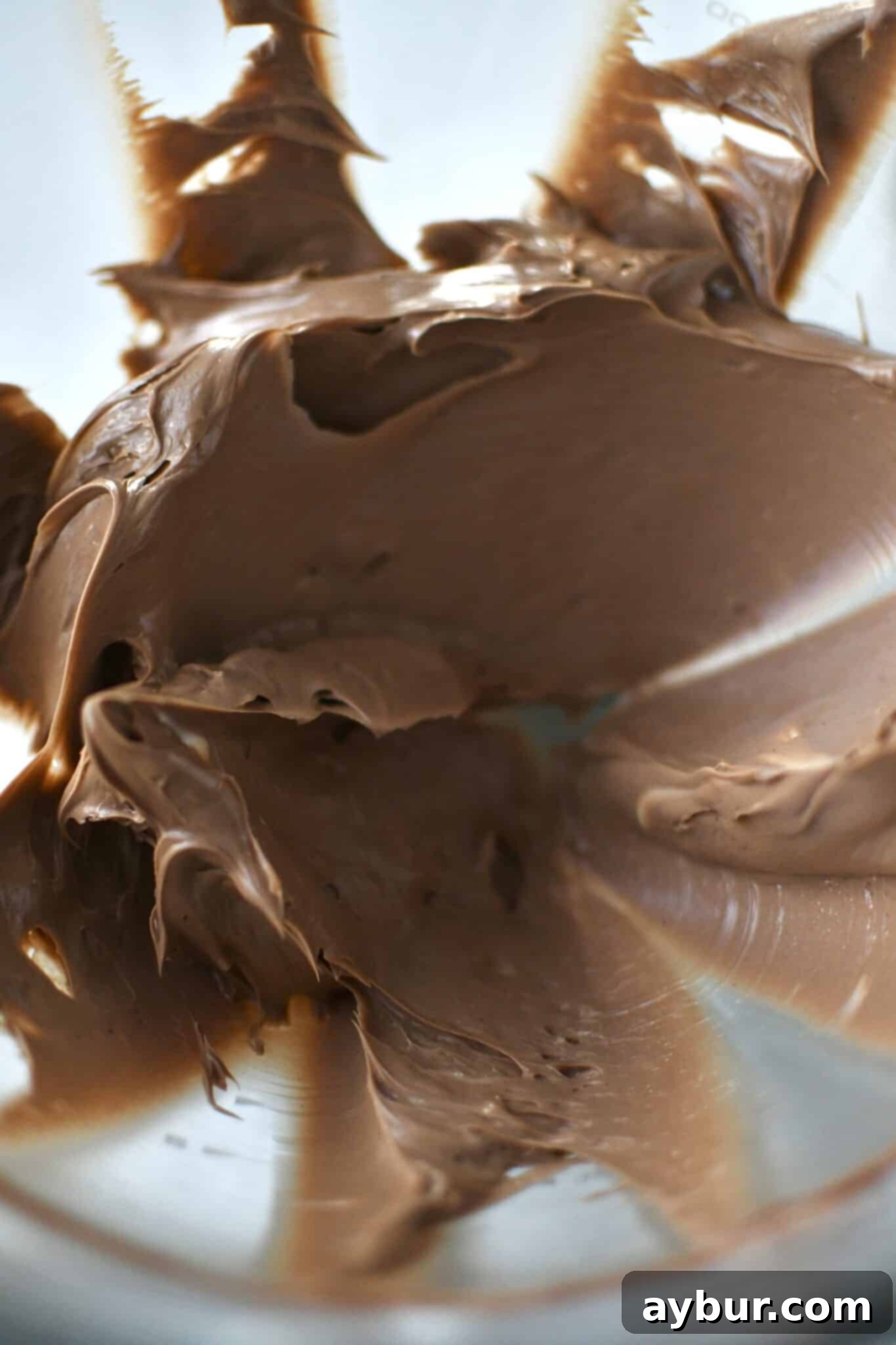 Peppermint Chocolate Delights 5 Creaming together softened butter and melted chocolate in a stand mixer.