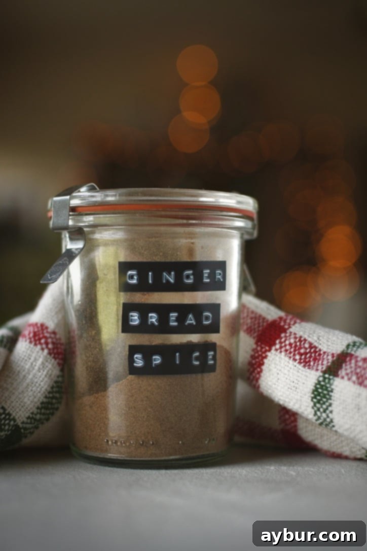 Freshly blended gingerbread spice mix stored in an elegant glass container, ready for use.