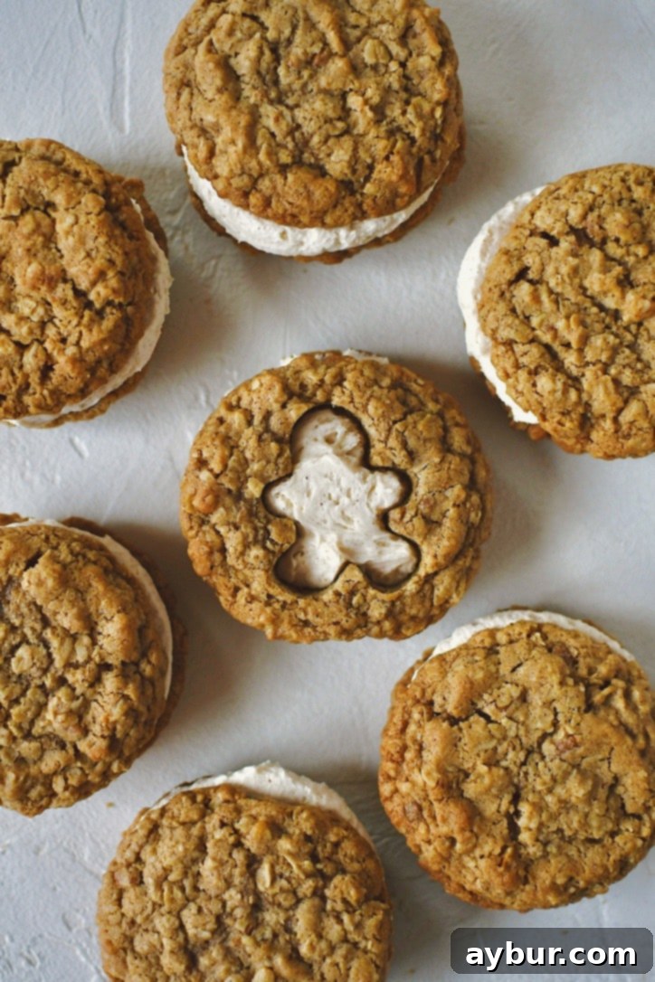Gingerbread Oatmeal Whoopie Pies 18 A close-up of a Gingerbread Oatmeal Cream Pie with a whimsical gingerbread man shape cut out, showcasing the creamy filling.
