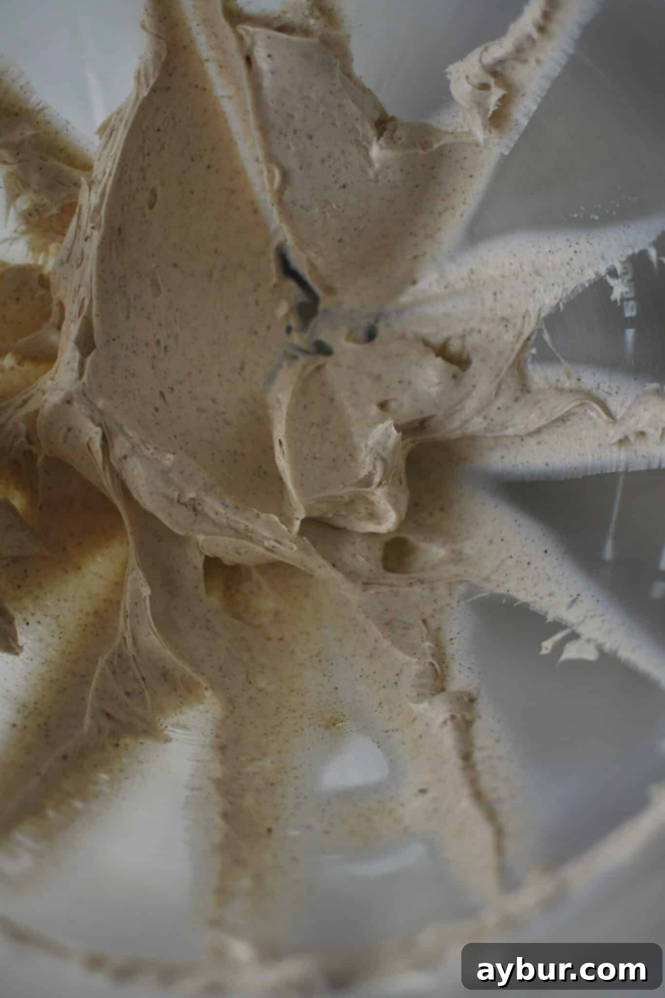 Festive Gingerbread Oatmeal Cream Pies 10 Creamed butter with vanilla and gingerbread spice mix added, creating an aromatic base for the filling.