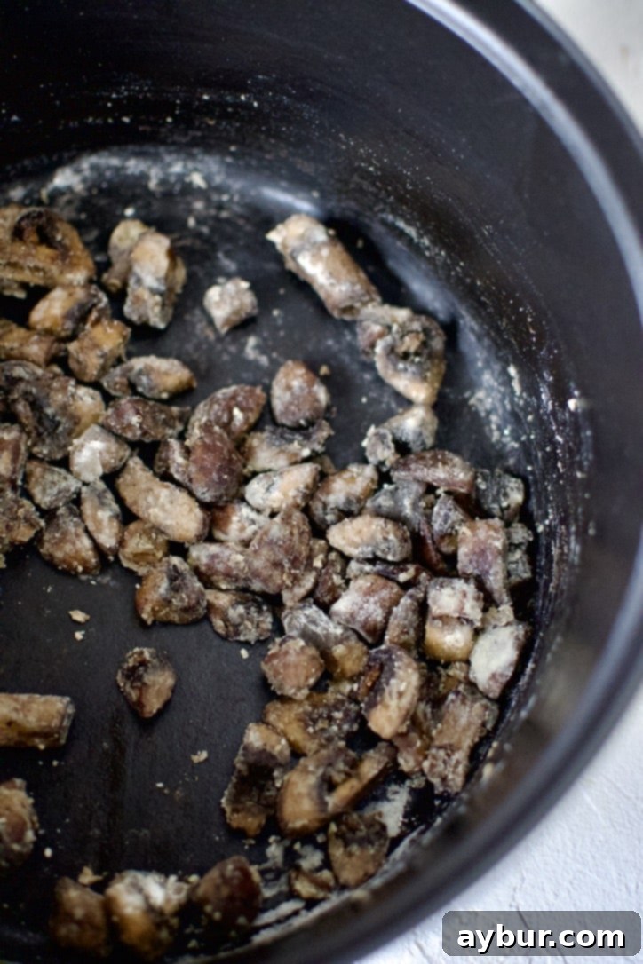 Cooked mushrooms coated in flour to make a roux.