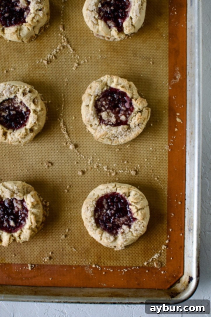 Peanut Butter Jelly Dream Cookies 11 Peanut Butter and Jelly Cookies after baking on a sheet pan cooling.