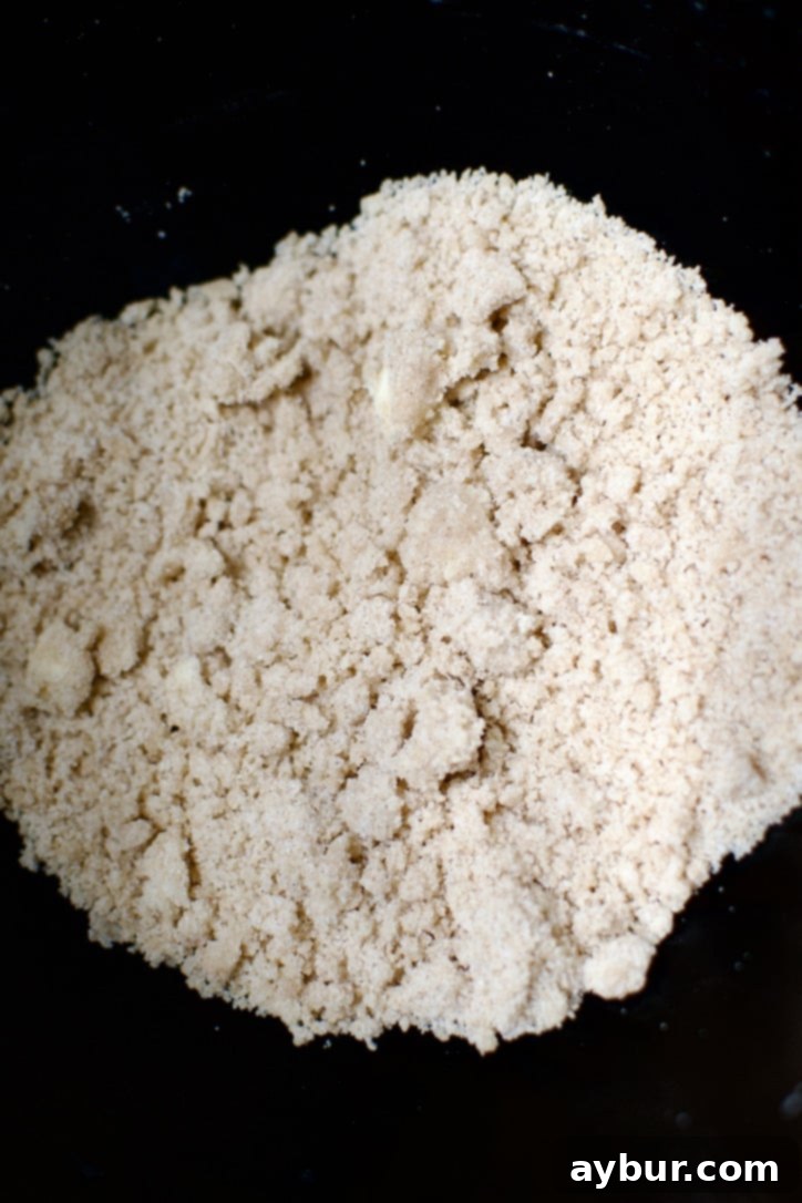 Peanut Butter Jelly Dream Cookies 5 Dry ingredients and butter in a mixing bowl after forming the crumble.