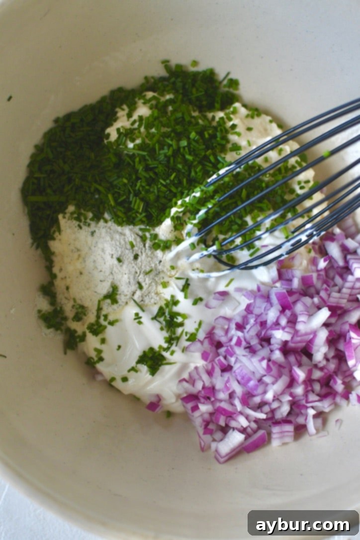 Creamy Ranch Potato Salad 6 Mixing up the sauce for the potato salad.