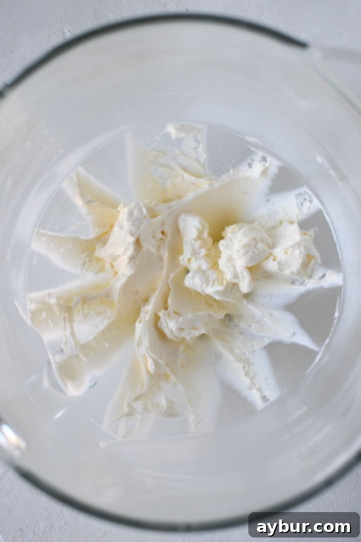 Butter and Cream Cheese creamed till fluffy in a stand mixer bowl.