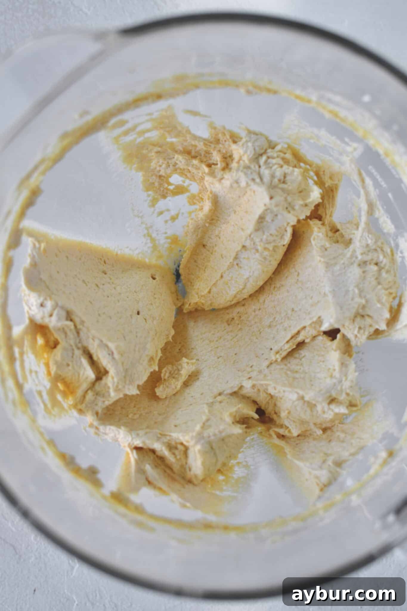 Creamed butter and sugar in the bowl of a stand mixer, pumpkin and egg beat in too.