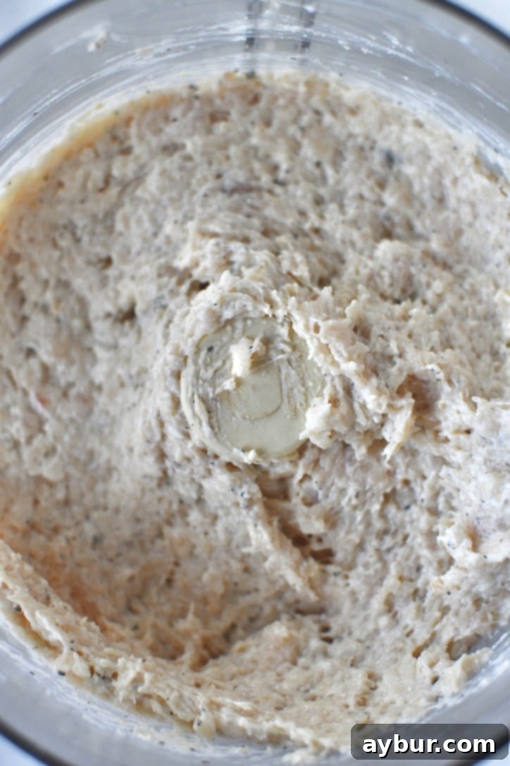 Flavorful Parmesan Chicken Meatballs 5 Adding creamy ricotta cheese to the chicken in a food processor for moisture.