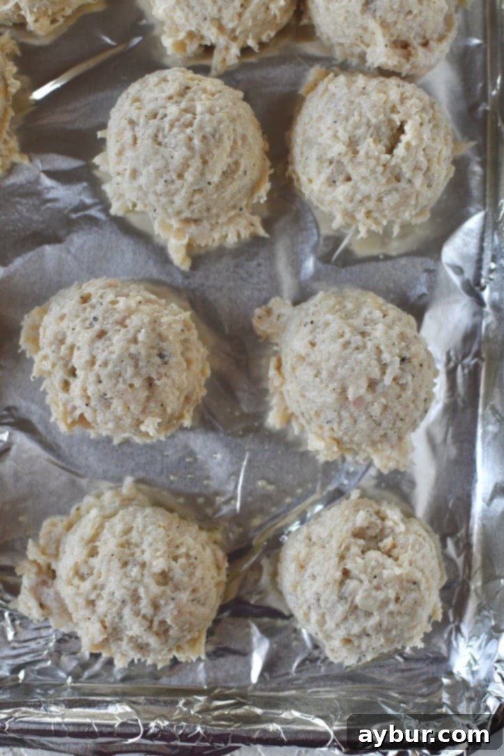 Flavorful Parmesan Chicken Meatballs 6 The blended meatball mixture in the food processor, showing a uniform texture.