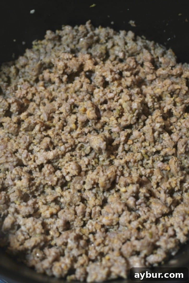 Browning the italian sausage as the first step in making the soup.