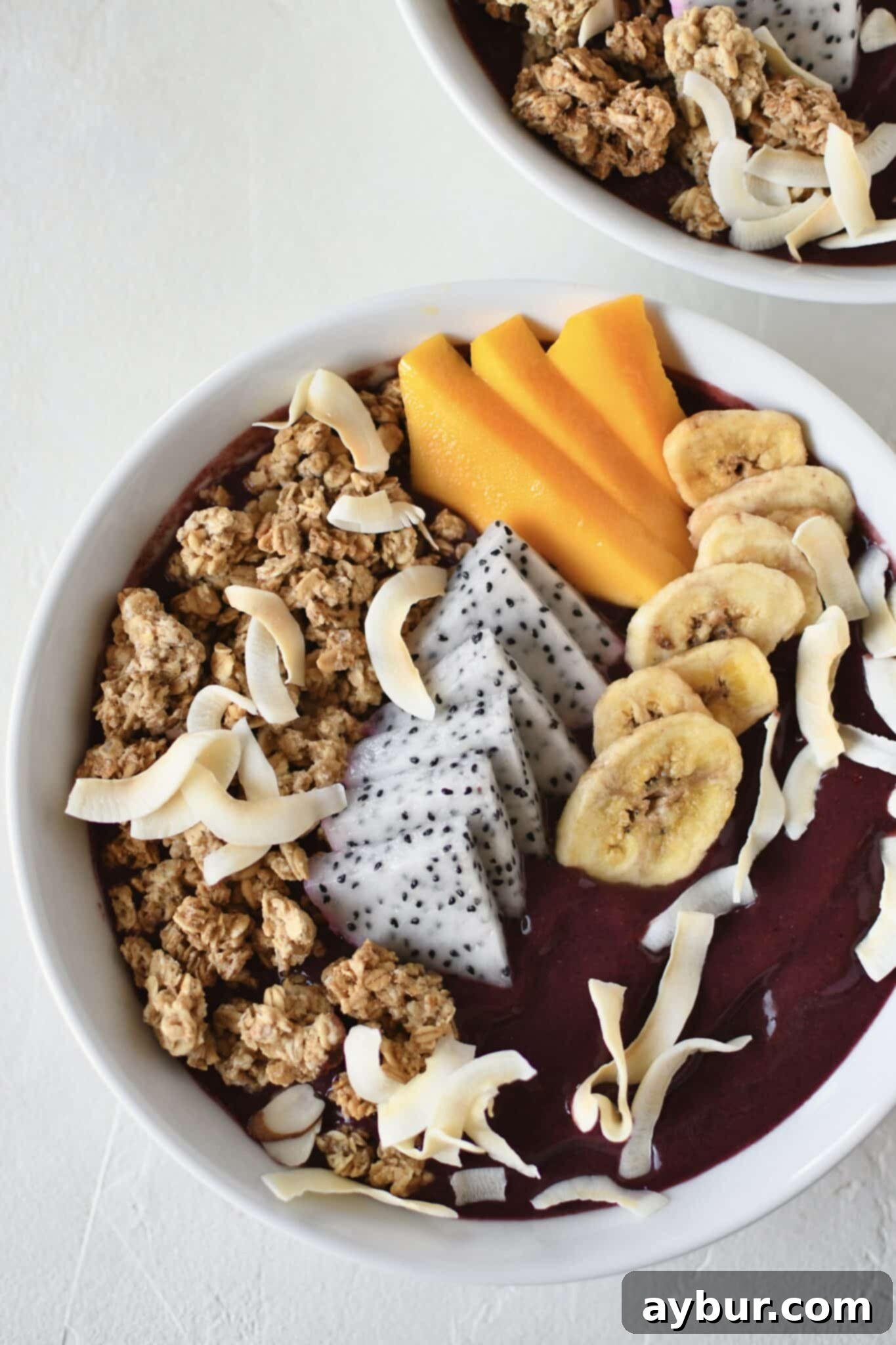 Smoothie Bowl, topped with fresh and dried fruit, ready to eat.