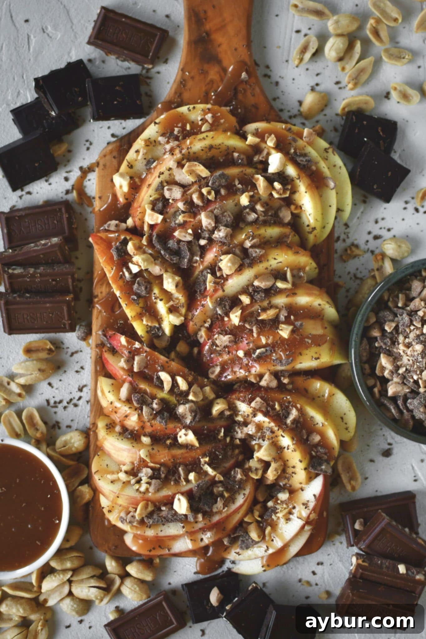 Apple Nachos on a cutting board, fully assembled and ready to eat.