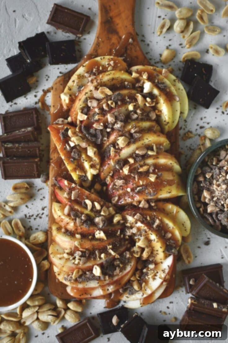 Apple Nachos on a cutting board, fully assembled and ready to eat.