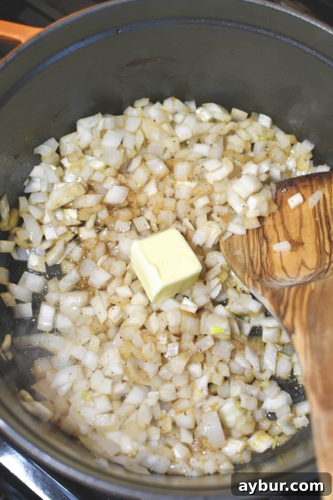 Onions cooked in the bacon fat, adding in some butter.
