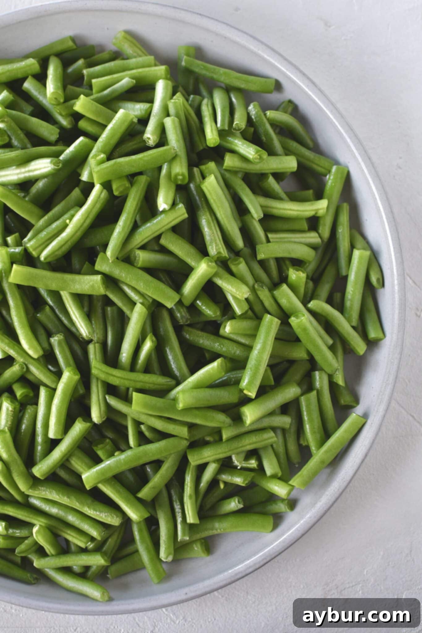 Trimmed and cut fresh green beans ready to be cooked.