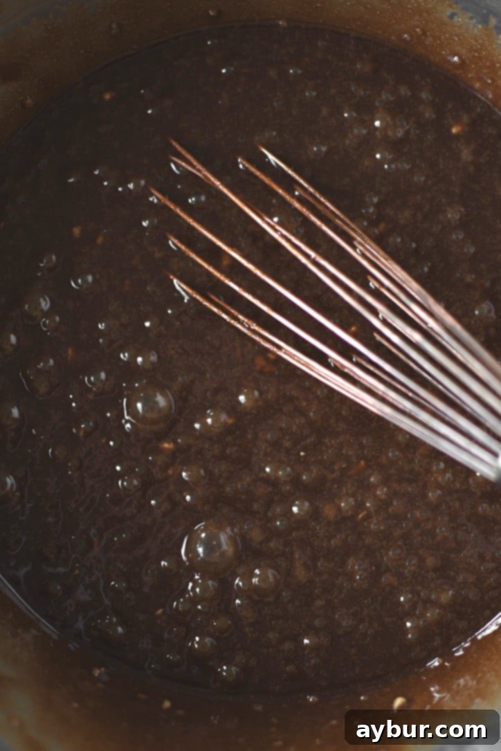 After whisking the eggs into the butter & sugar mixture, it should be frothy.