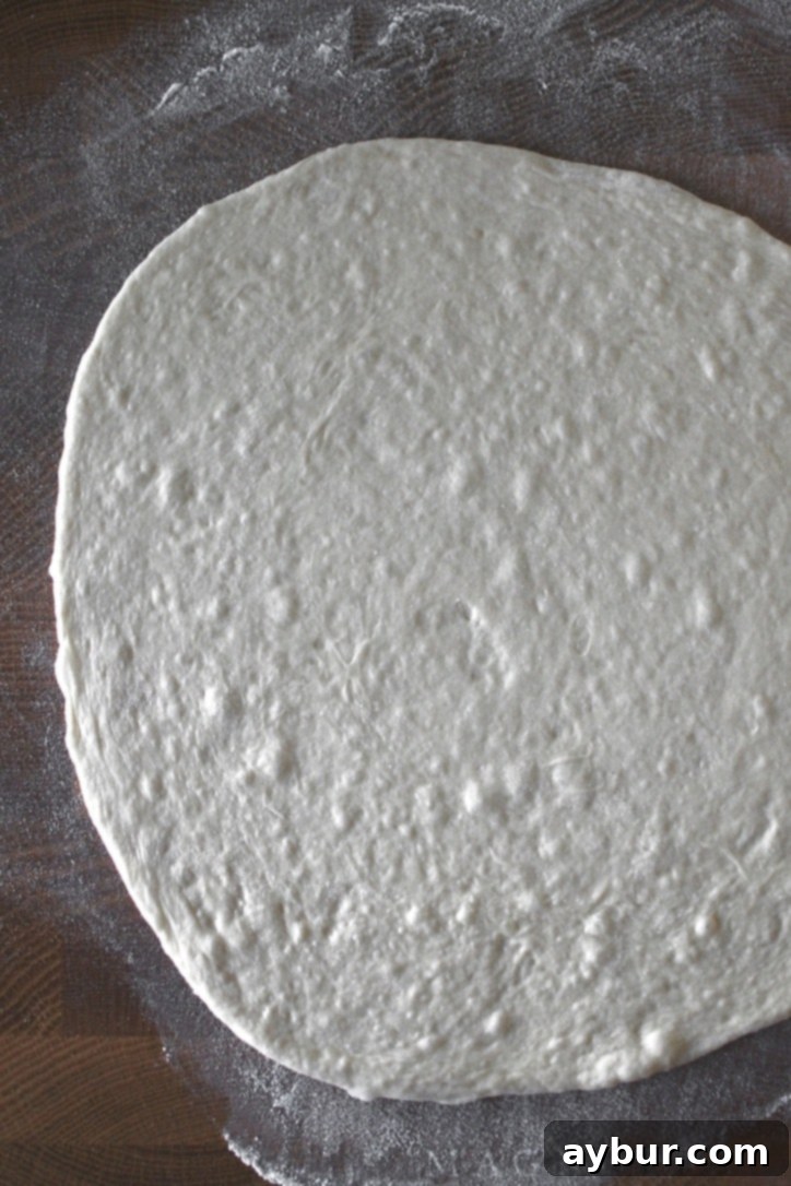 Perfect Homemade Calzone Dough 11 Rolled out dough ready to be made into a calzone.