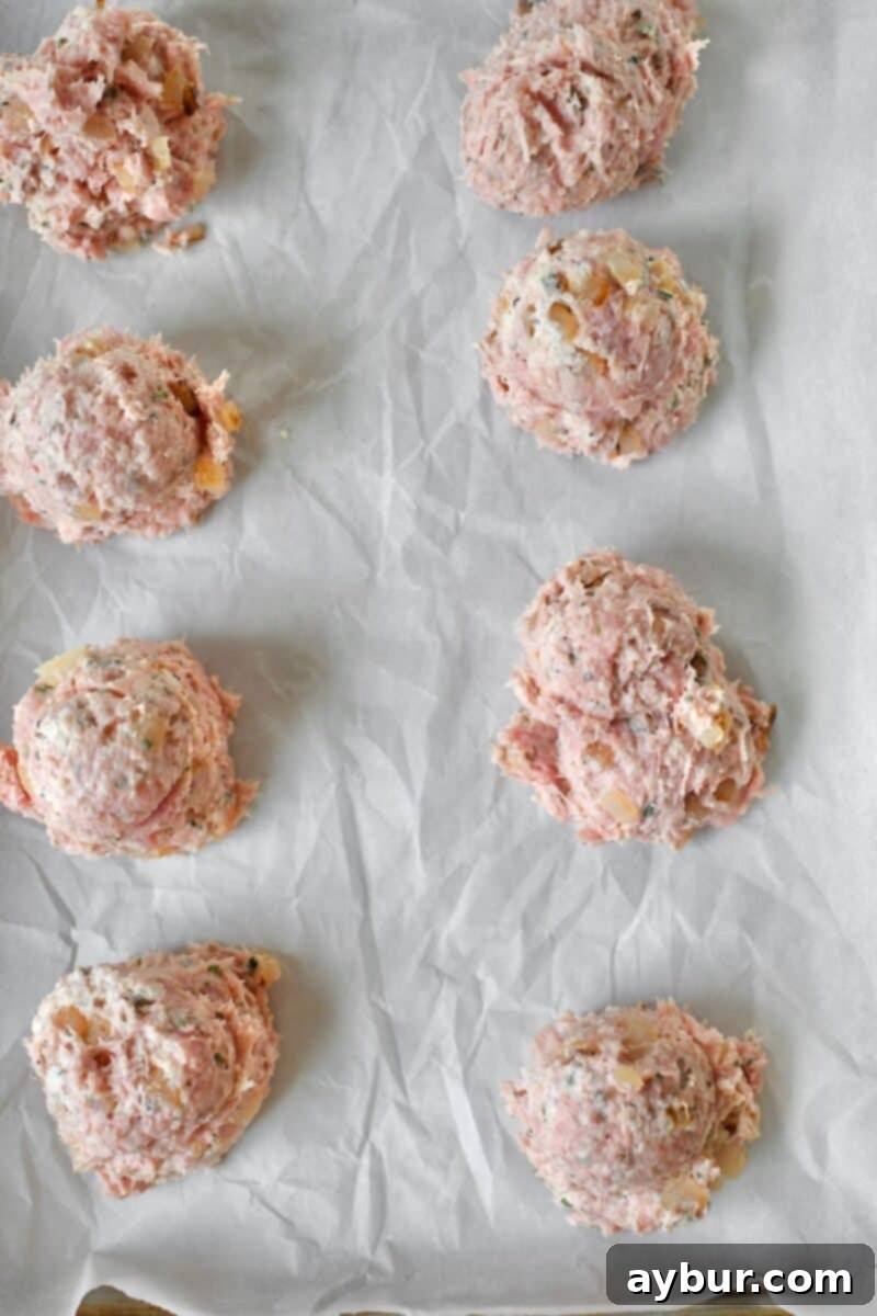 A bowl of fully combined turkey burger mixture, ready for portioning into patties.