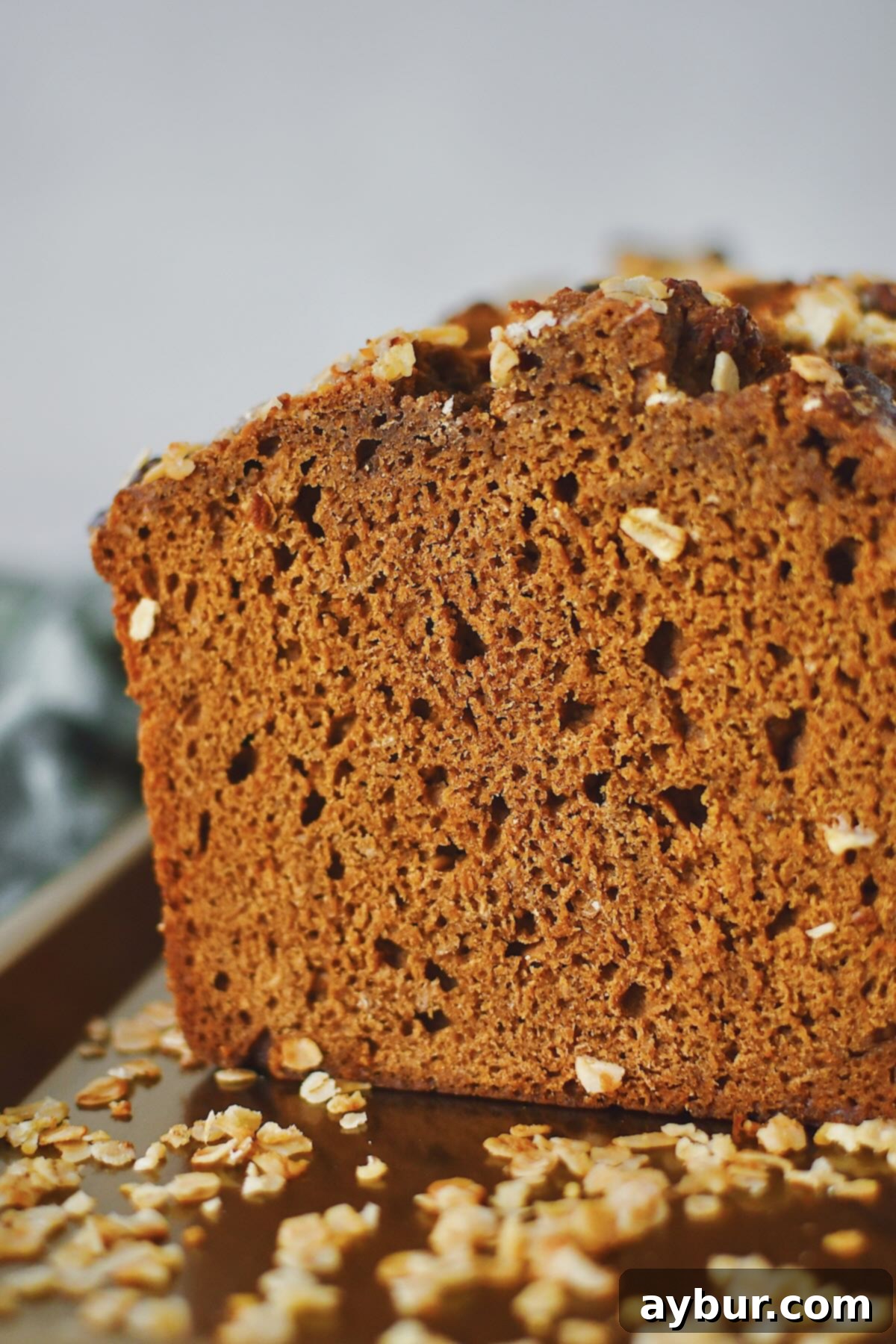 Traditional Irish Brown Bread 2 Freshly baked Irish Brown Bread, perfectly sliced and arranged on a wooden board, ready to be enjoyed.