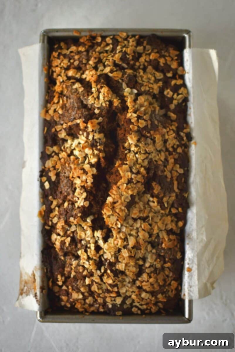Traditional Irish Brown Bread 11 A freshly baked loaf of golden brown bread, just removed from the oven, with a beautiful crust.