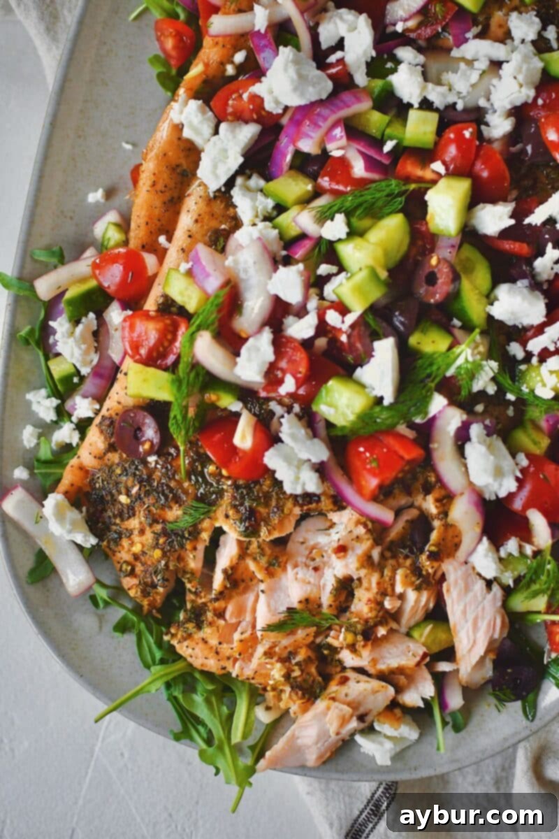 Zesty Greek Salmon 14 Greek Salmon topped with Greek salad topping of fresh veggies and feta cheese.
