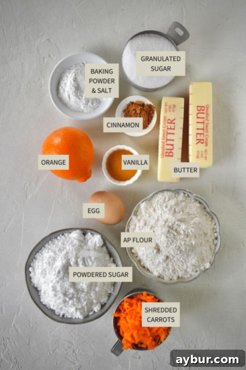 Spiced Carrot Cake Cookies 3 Freshly shredded carrots and other cookie ingredients laid out, ready for baking delicious carrot cake cookies.