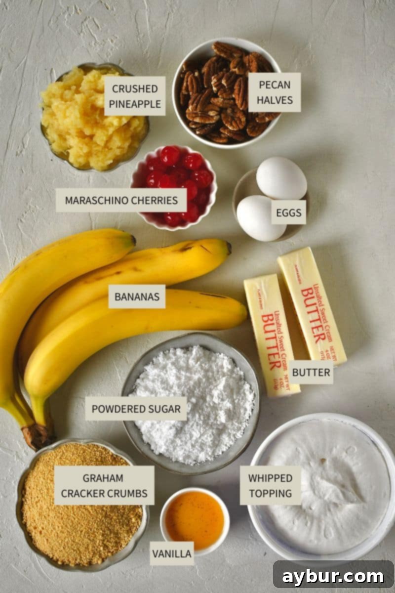 Ultimate Banana Split Cake 3 All the fresh ingredients meticulously laid out, ready to be transformed into a delicious Banana Split Cake, including ripe bananas, crushed pineapple, maraschino cherries, graham cracker crumbs, butter, powdered sugar, eggs, vanilla extract, and whipped topping.