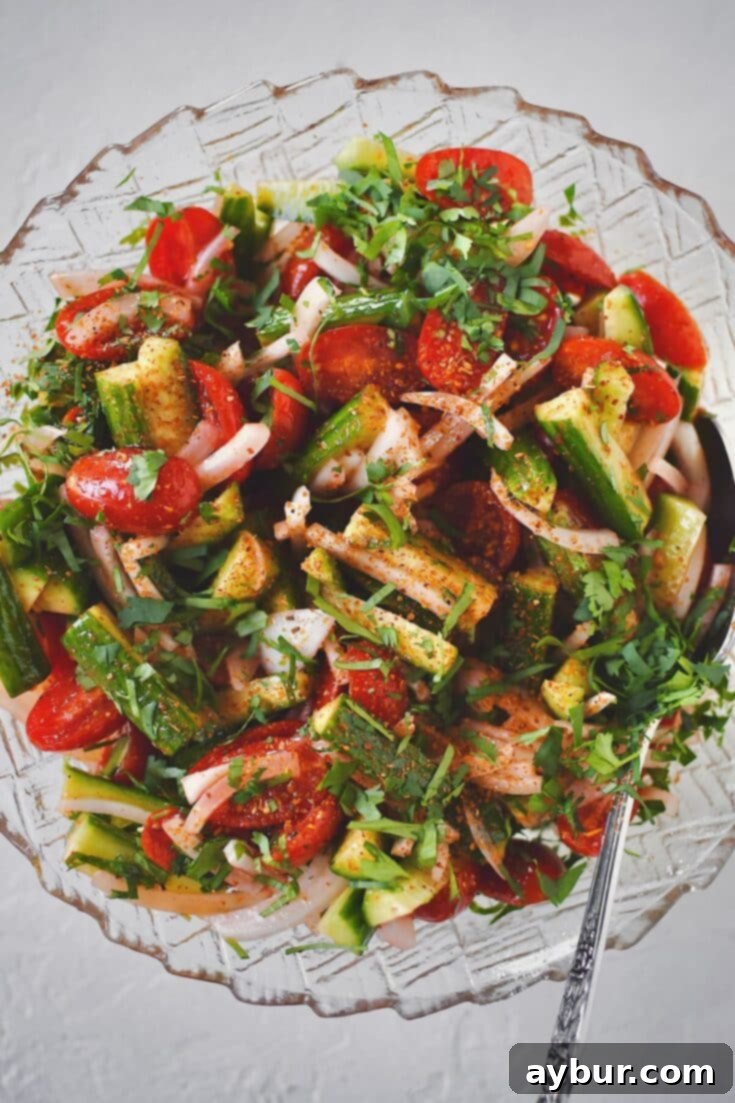 Mexican-Inspired Cucumber, Tomato, and Onion Salad with Chamoy and Tajin