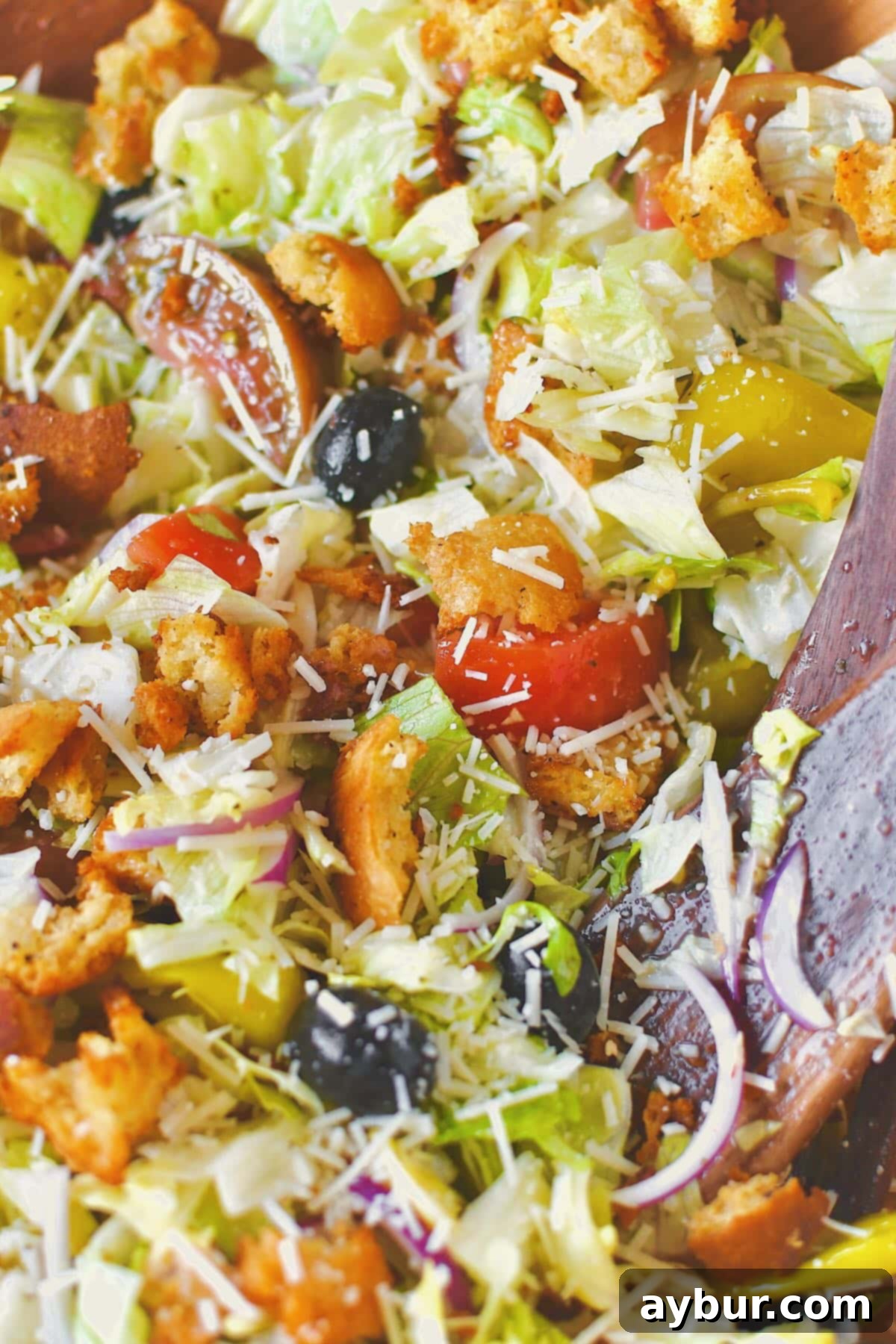 Tossed Olive Garden Italian Salad, vibrant and perfectly dressed, ready for immediate serving.