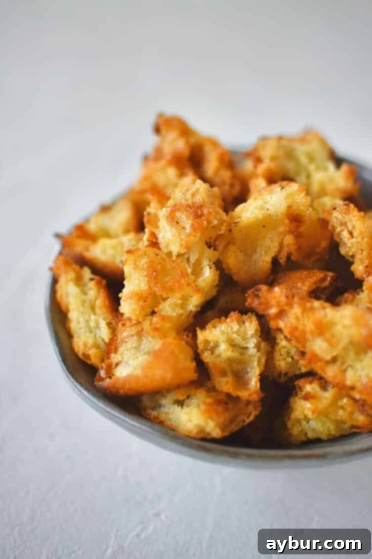 Homemade Croutons in a bowl ready to be used in a fresh salad.