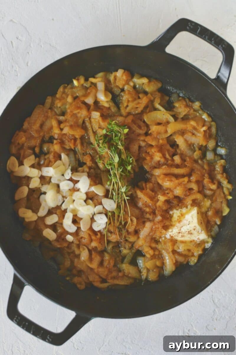 Caramelized French Onion Chicken 8 Adding butter, fresh herbs, aromatic spices like nutmeg, and thinly sliced garlic to the deeply caramelized onions.