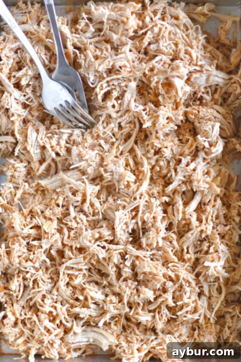 Chicken after cooking and after shredding.