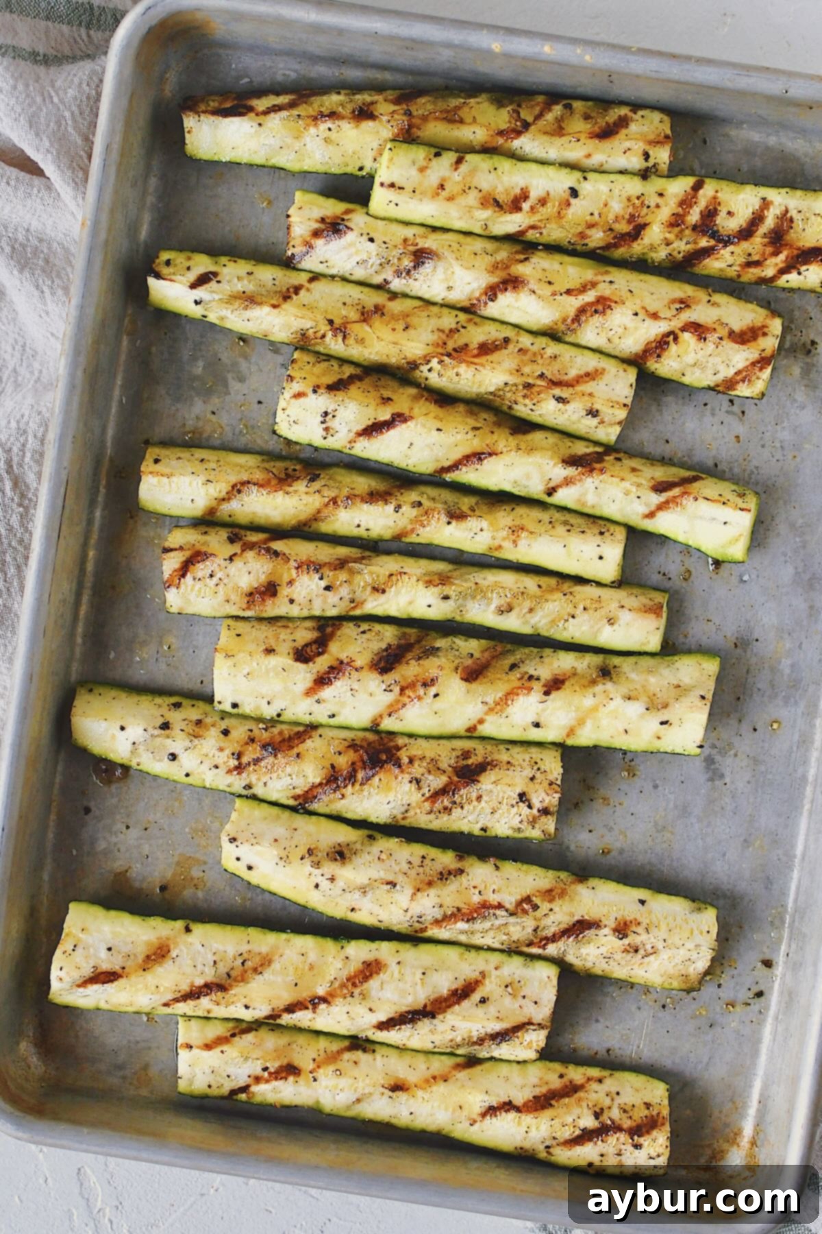 Perfectly grilled zucchini, fresh off the hot grates and ready for serving.