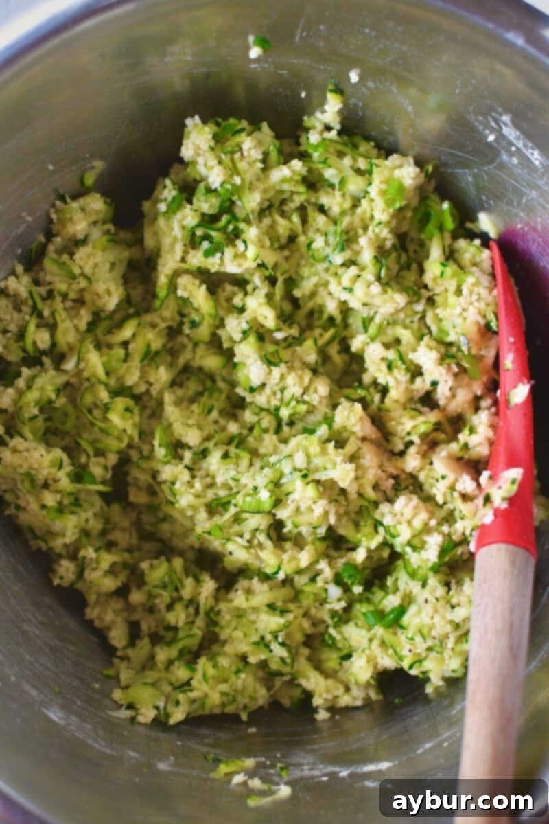 Fully mixed zucchini batter ready to be fried up.