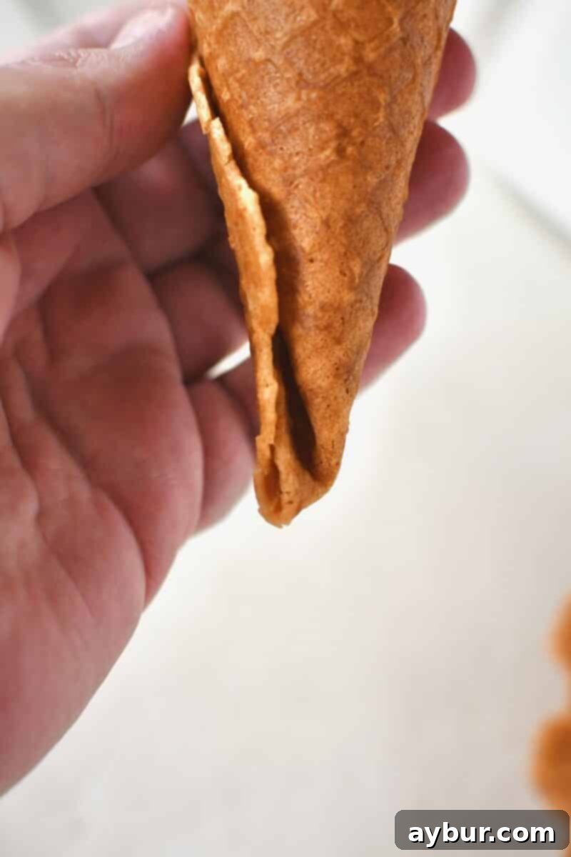 Crispy Homemade Waffle Cones 12 Fully formed waffle cone, properly folded with no hole in the bottom.