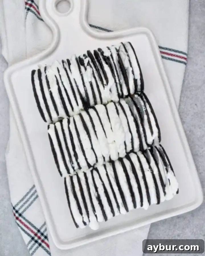 Chocolate Wafer Icebox Cake being assembled