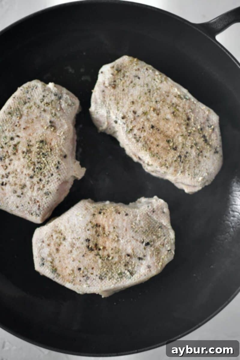 Perfectly Tender Sous Vide Pork Chops 8 Olive oil warmed in a skillet, and searing the sous vide pork chops until crisp and dark brown on both sides.