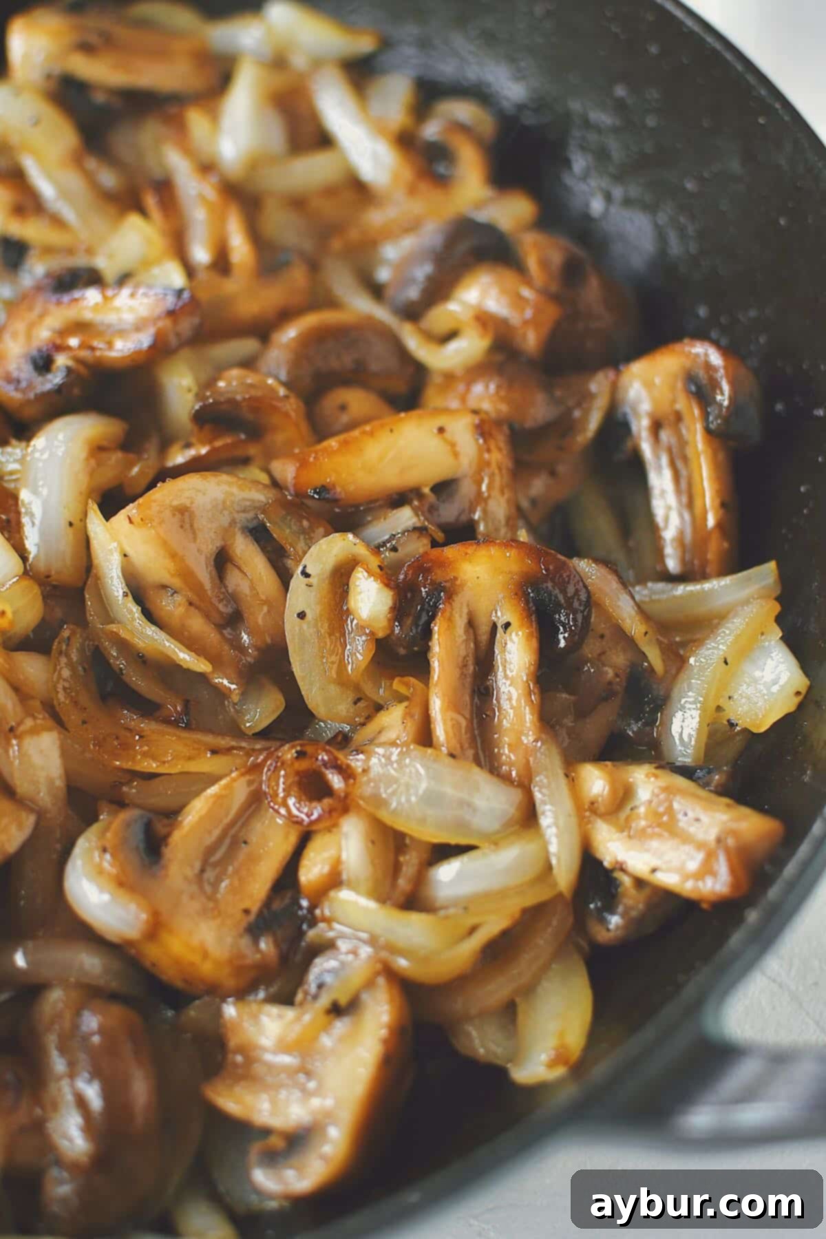 Caramelized Mushrooms and Onions 8 Serving of perfectly sautéed mushrooms and onions ready to be enjoyed as a delicious and easy side dish.