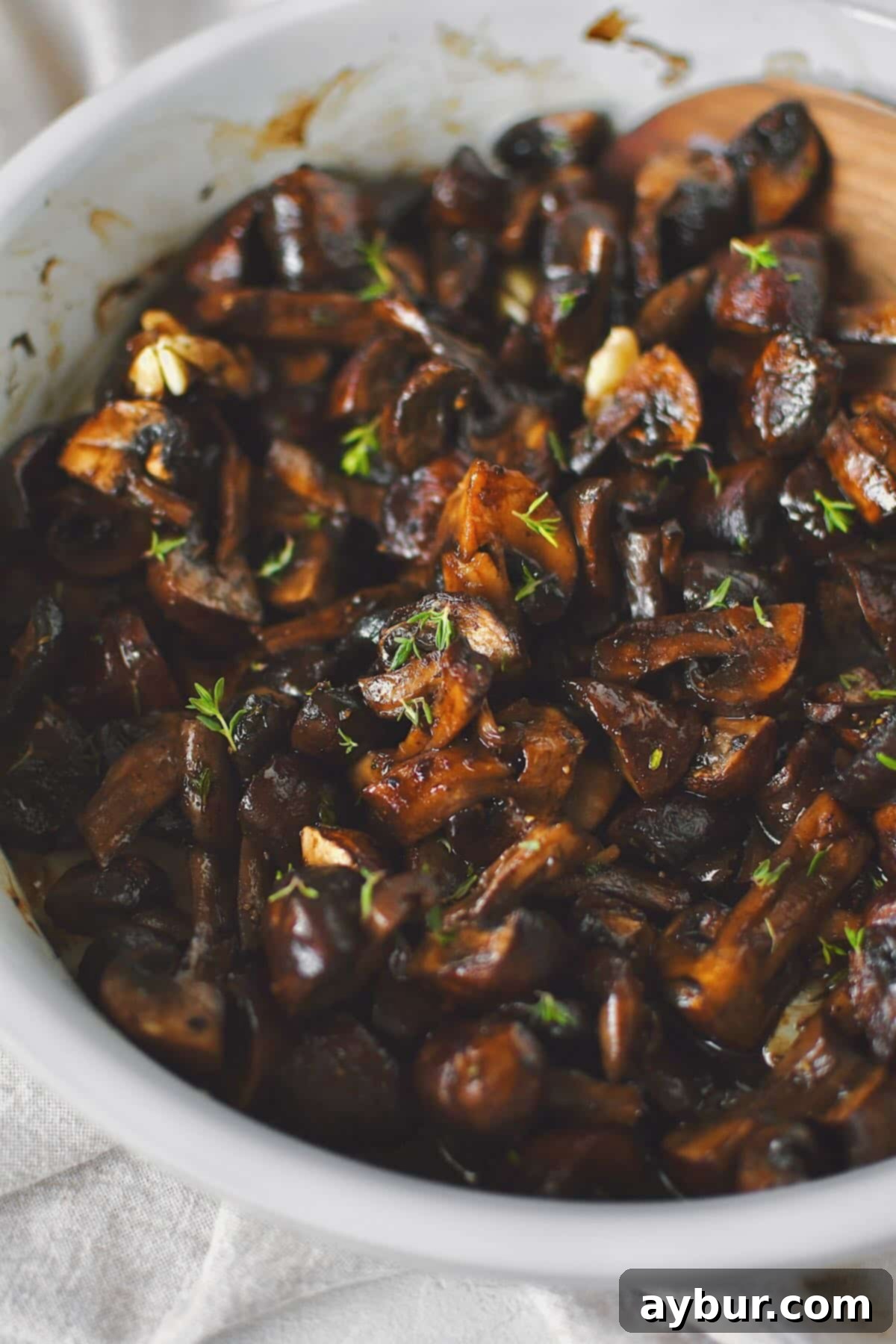 Earthy Roasted Delights 6 Close-up of roasted mushrooms glistening with aged balsamic vinegar, ready to serve.