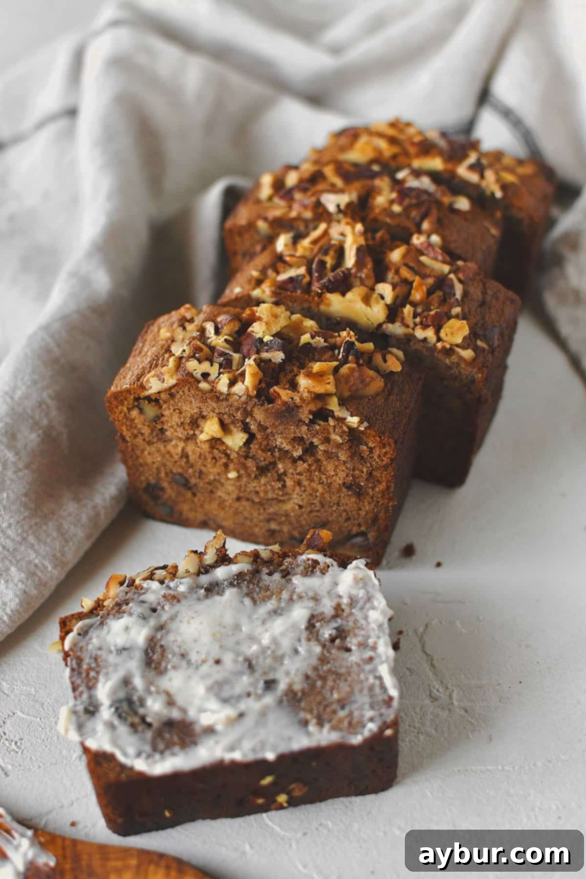 Sliced Starbucks Banana Bread Recipe ready to be enjoyed and topped with a smear of butter.