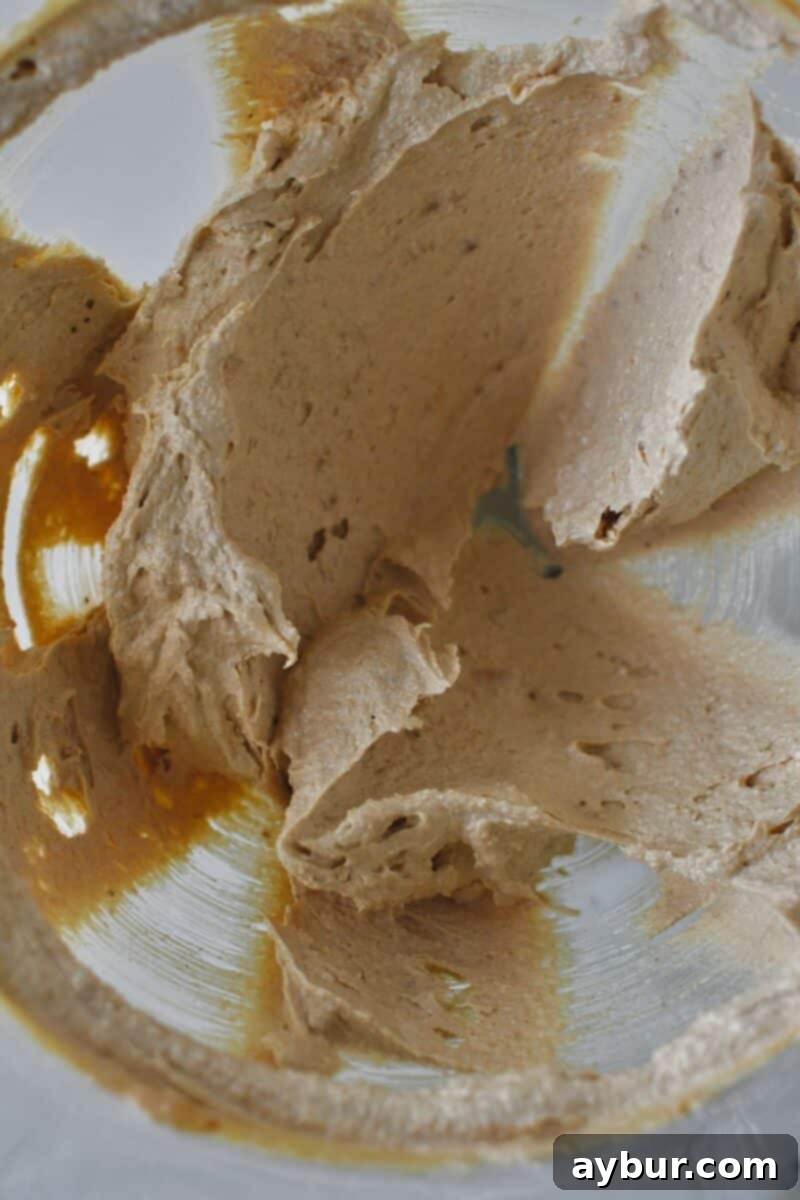 Peanut Butter Kitchen Sink Cookies 5 Butters and sugars in the stand mixer bowl after being perfectly creamed into a light and fluffy consistency.