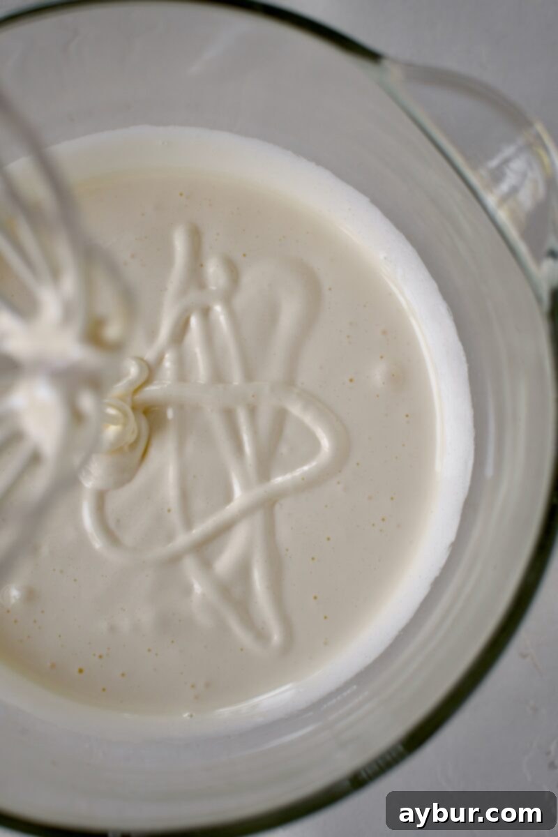 Eggs and sugar whipped until they are so light and they hold a ribbon on top for 3 seconds.