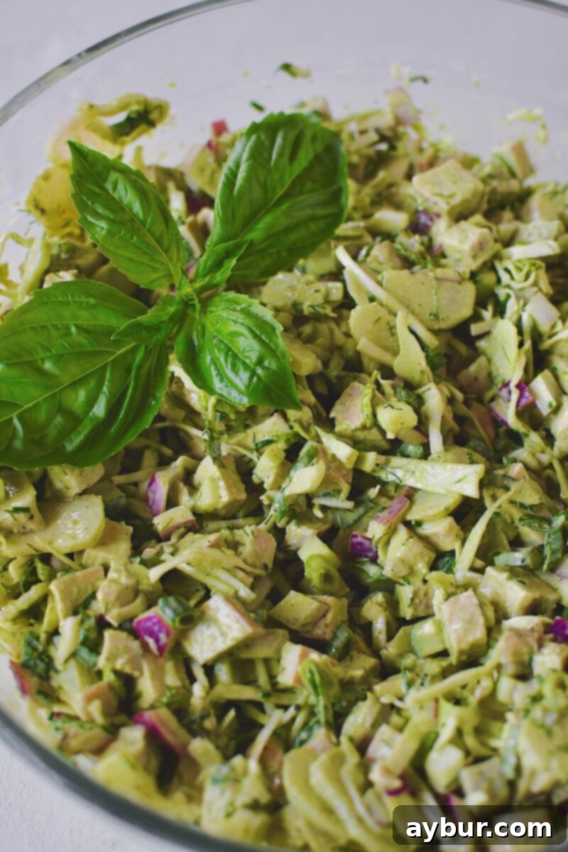 Emerald Goddess Chicken Salad 6 Green Goddess Chicken Salad in a large bowl, ready to make sandwiches with.