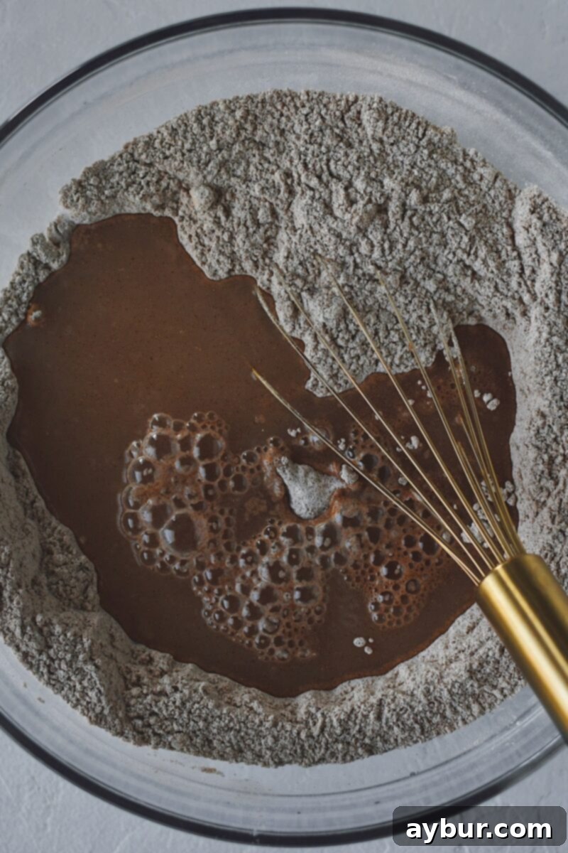 Salt Dough Gingerbread Keepsakes 6 Adding the water to the dry ingredients to make the dough.