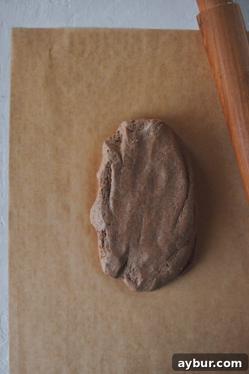 Salt Dough Gingerbread Keepsakes 8 One third of the dough, on a piece of parchment paper, ready to be rolled out.