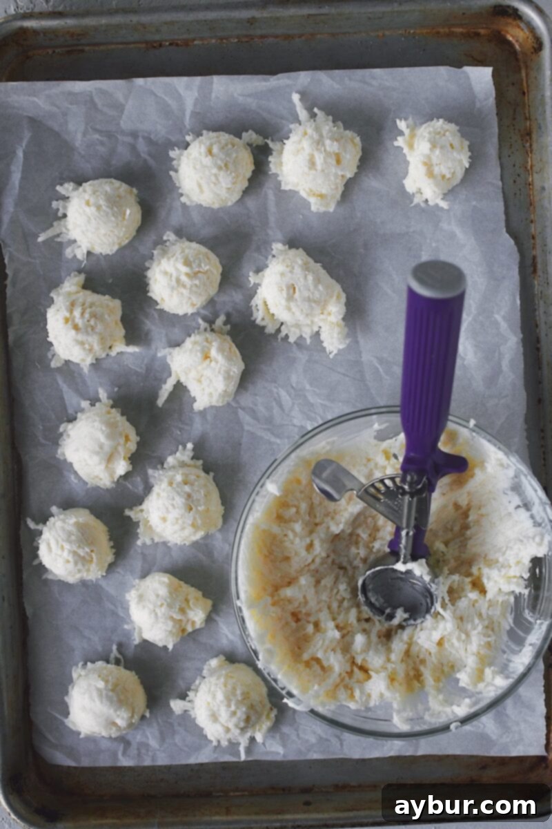 Scooping out the candy mixture into irregular portions.