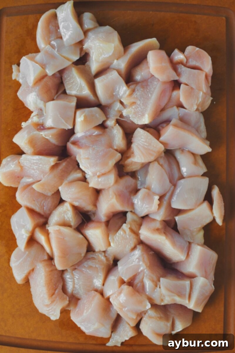 Diced Chicken on a cutting board.