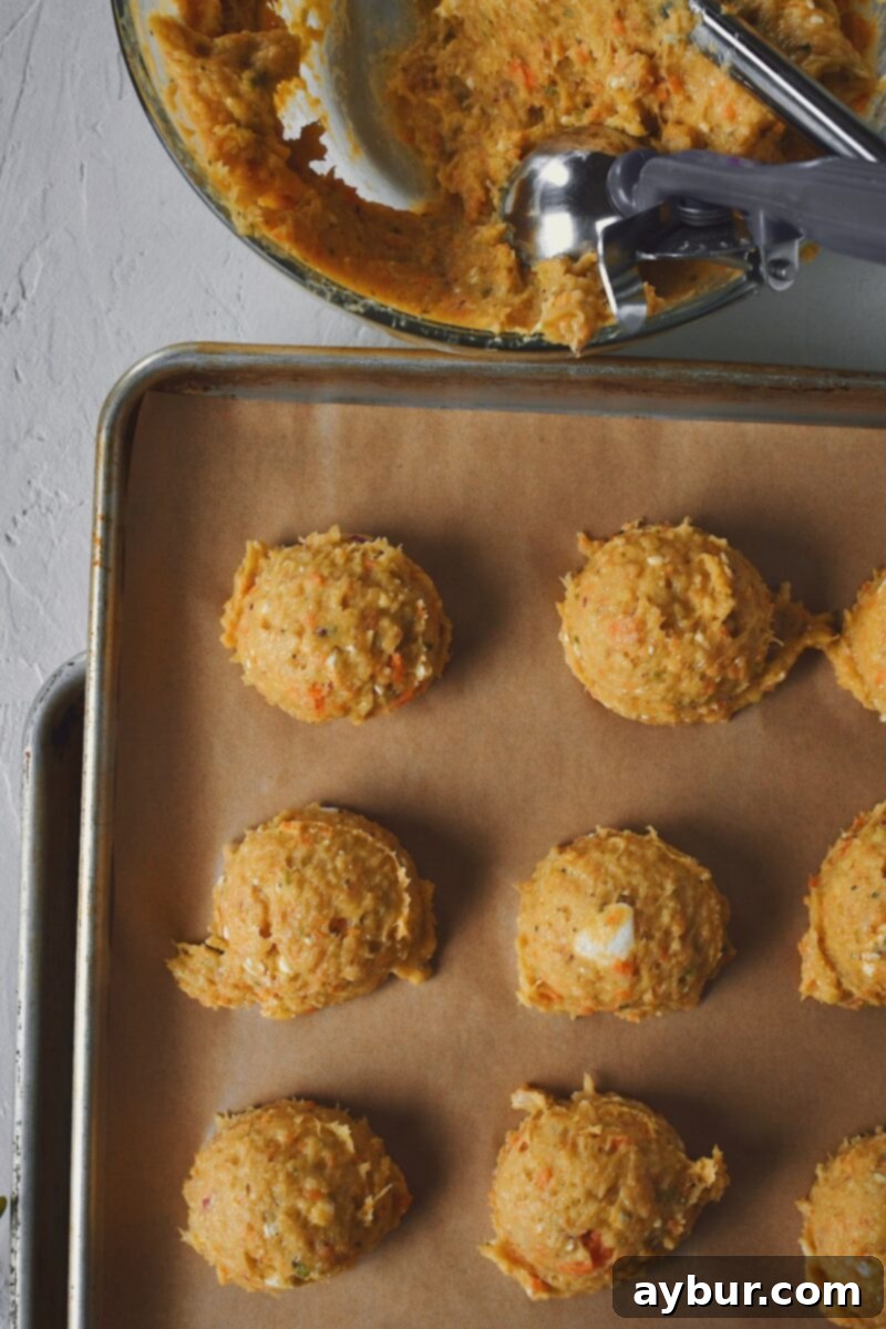 Portioning out the meatball mixture.