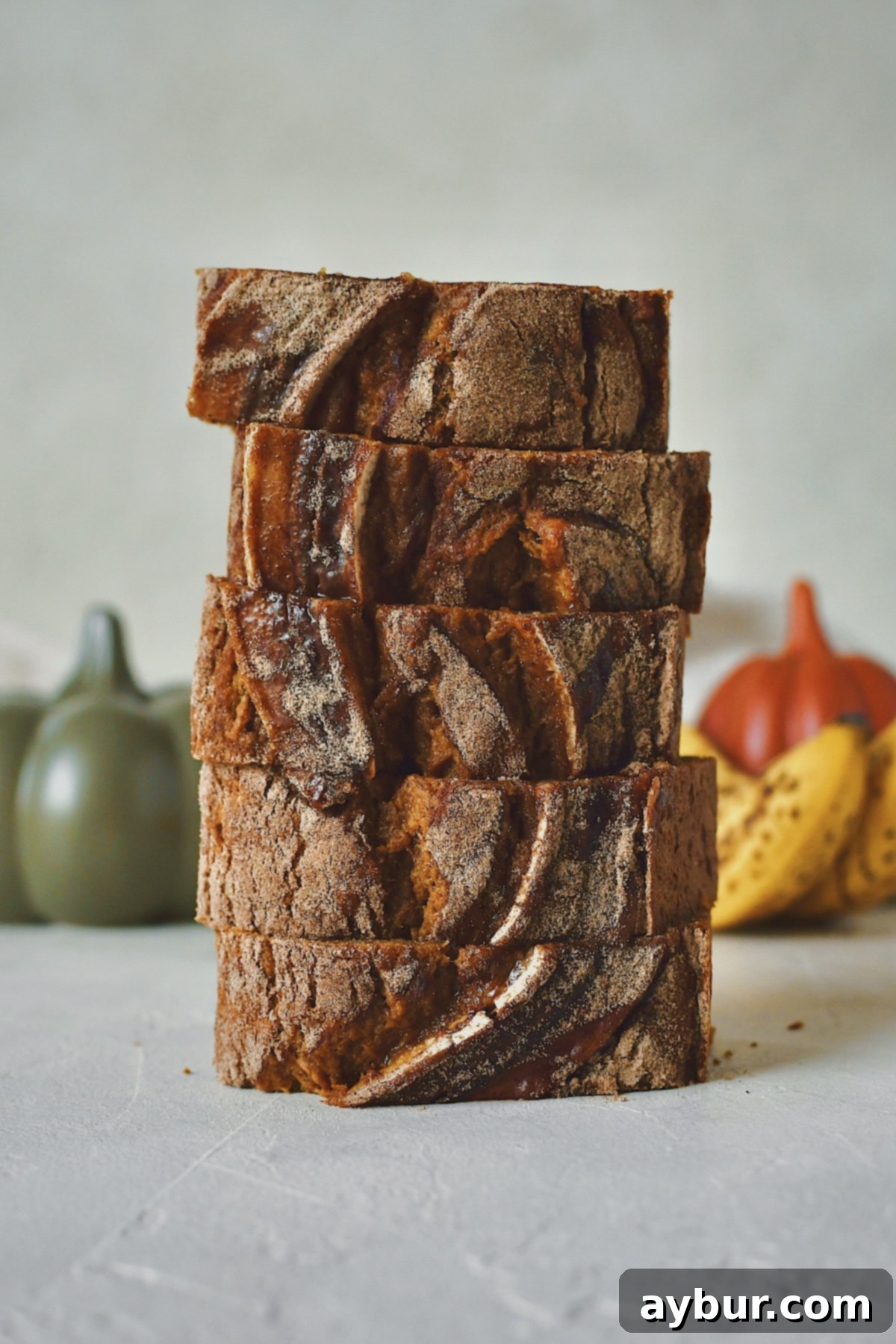 Pumpkin Banana Bread, after cooling and slicing, stack like a tower.