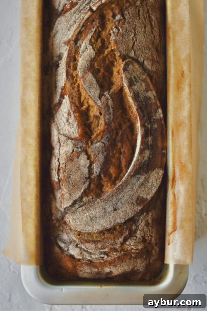 Batter and halved banana topped with cinnamon sugar after baking.